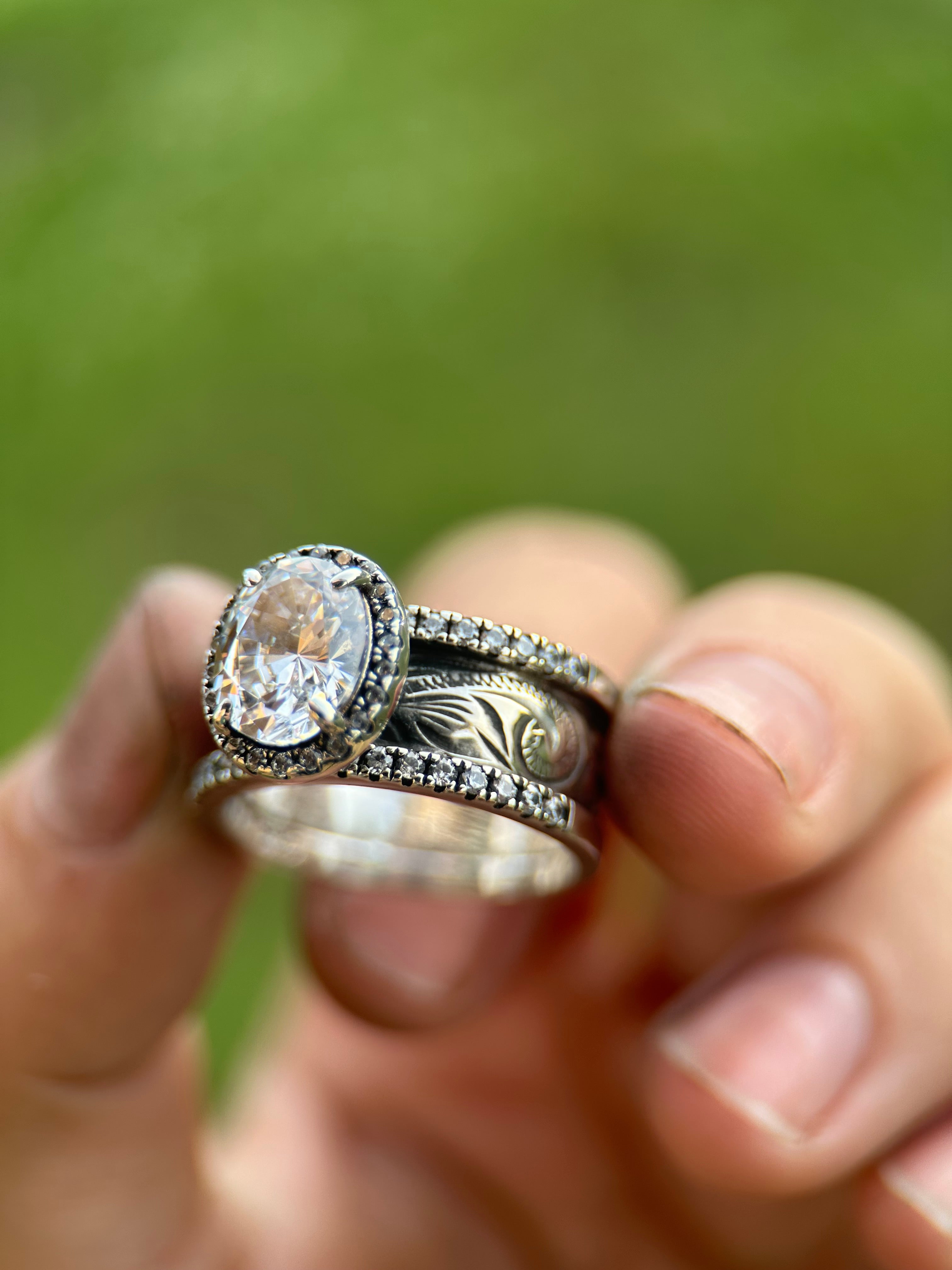 OVAL HALO PAVÈ CIGAR ENGAGEMENT RING.