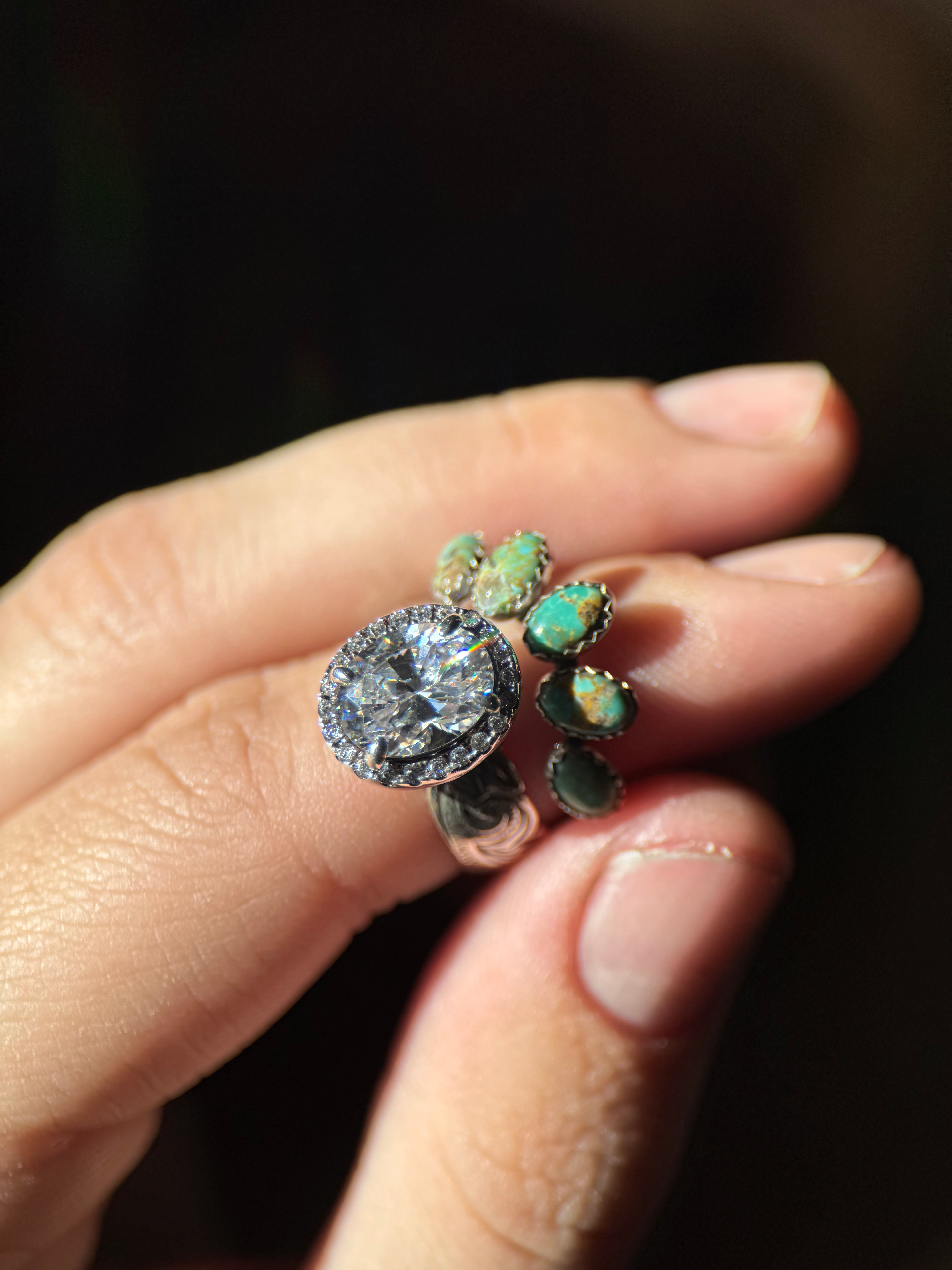 OVAL HALO ENGAGEMENT RING.