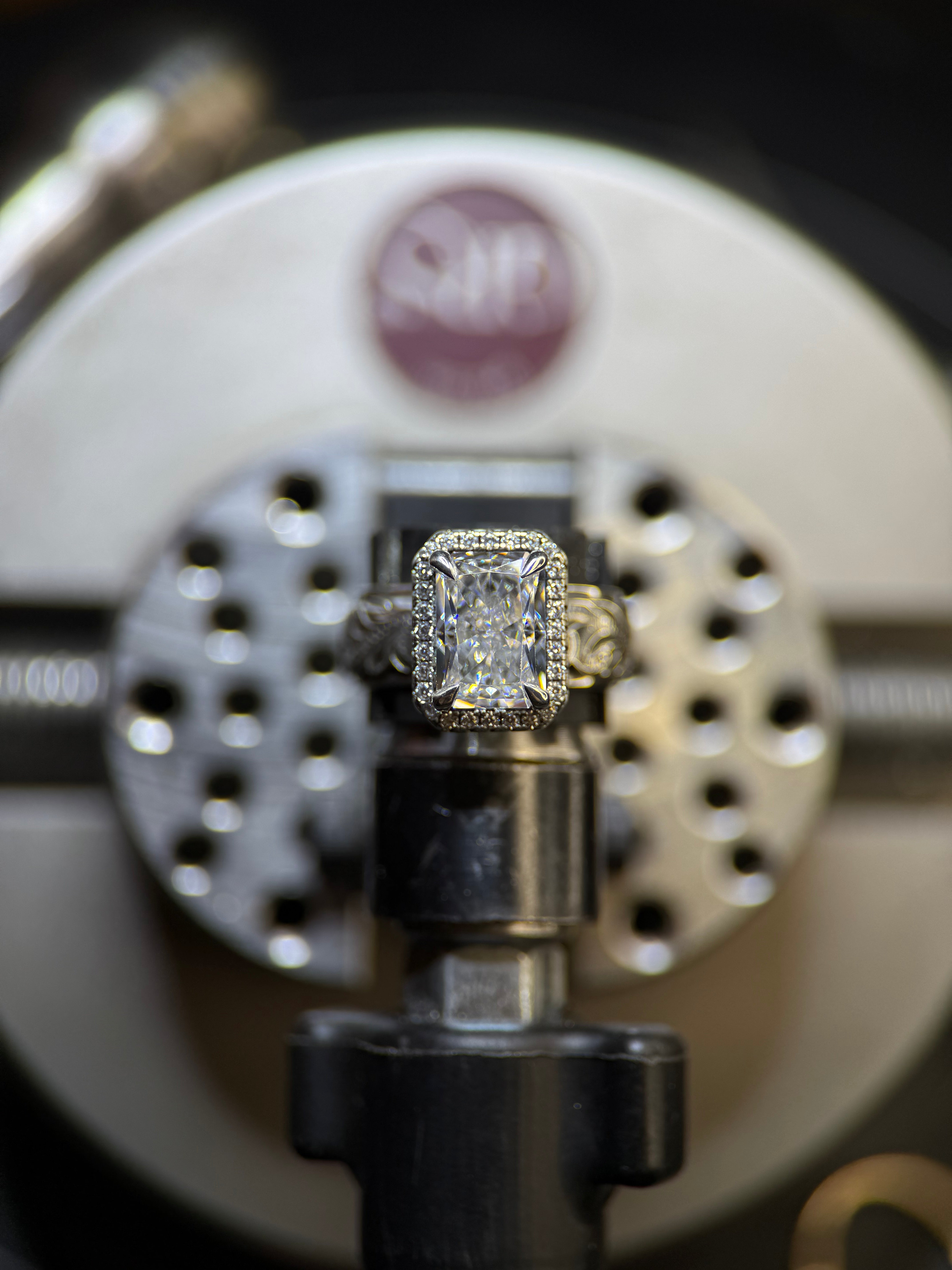 OVAL HALO PAVÈ CIGAR ENGAGEMENT RING.