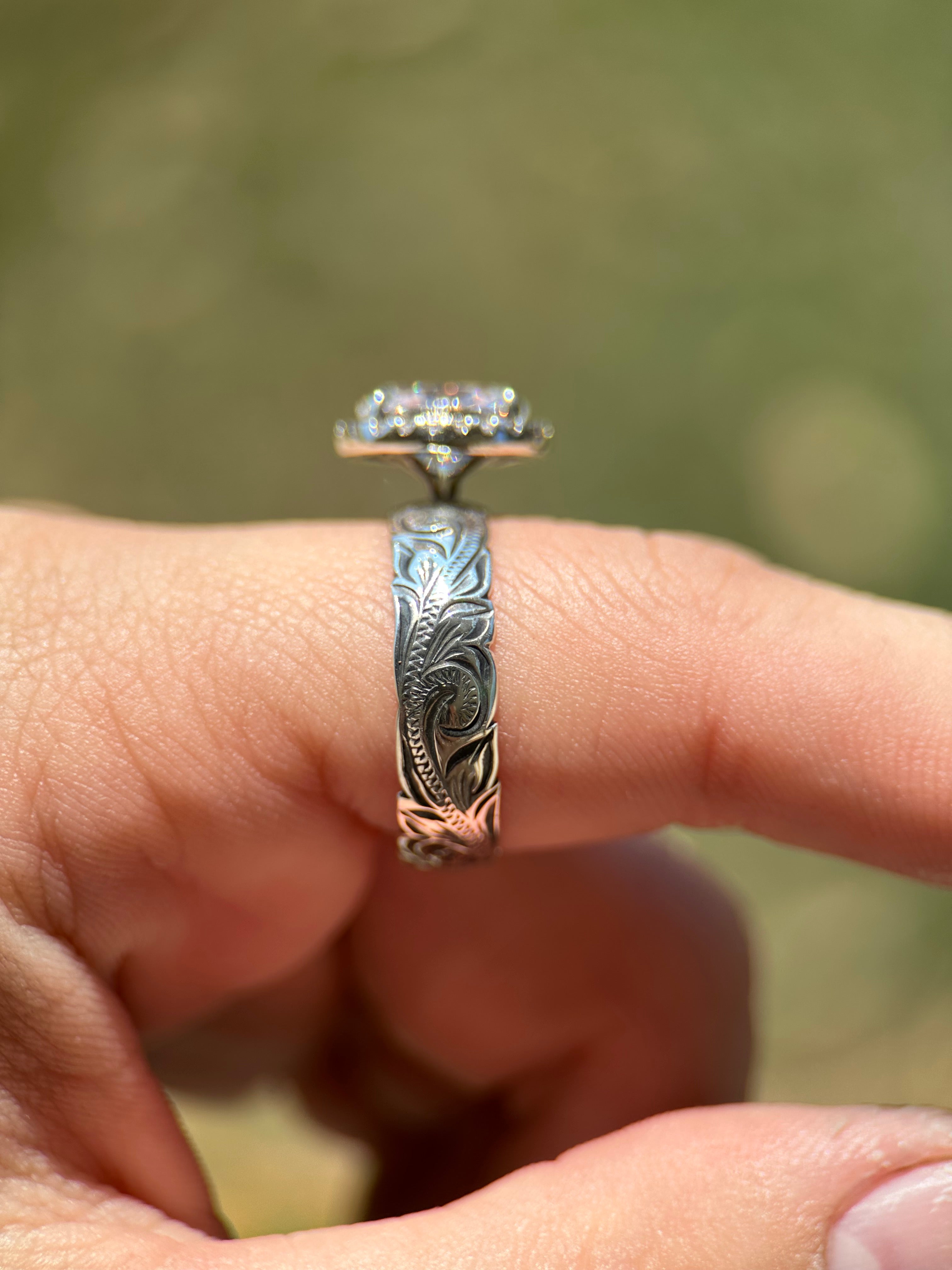 OVAL HALO ENGAGEMENT RING.