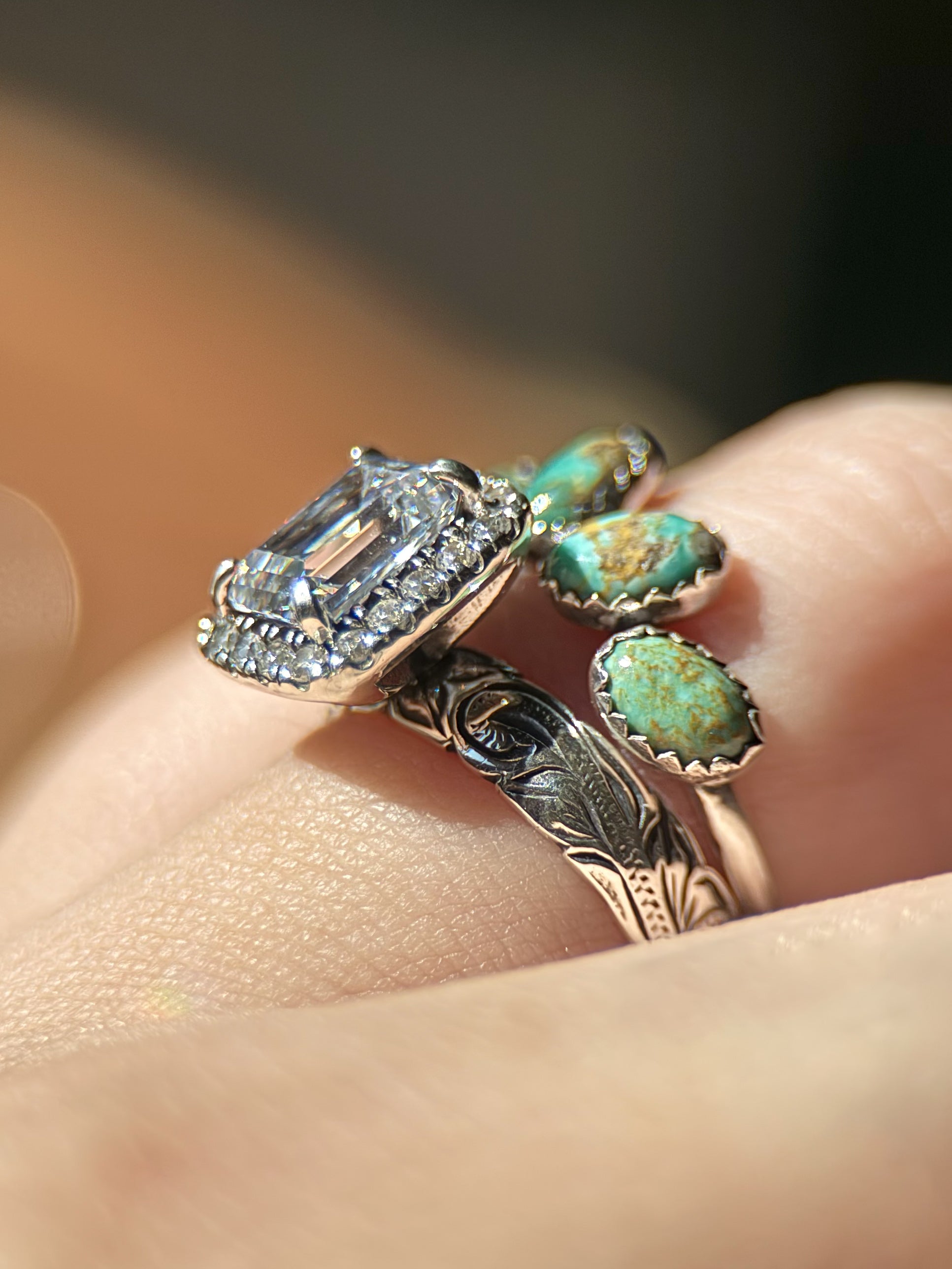 OVAL HALO PAVÈ CIGAR ENGAGEMENT RING.