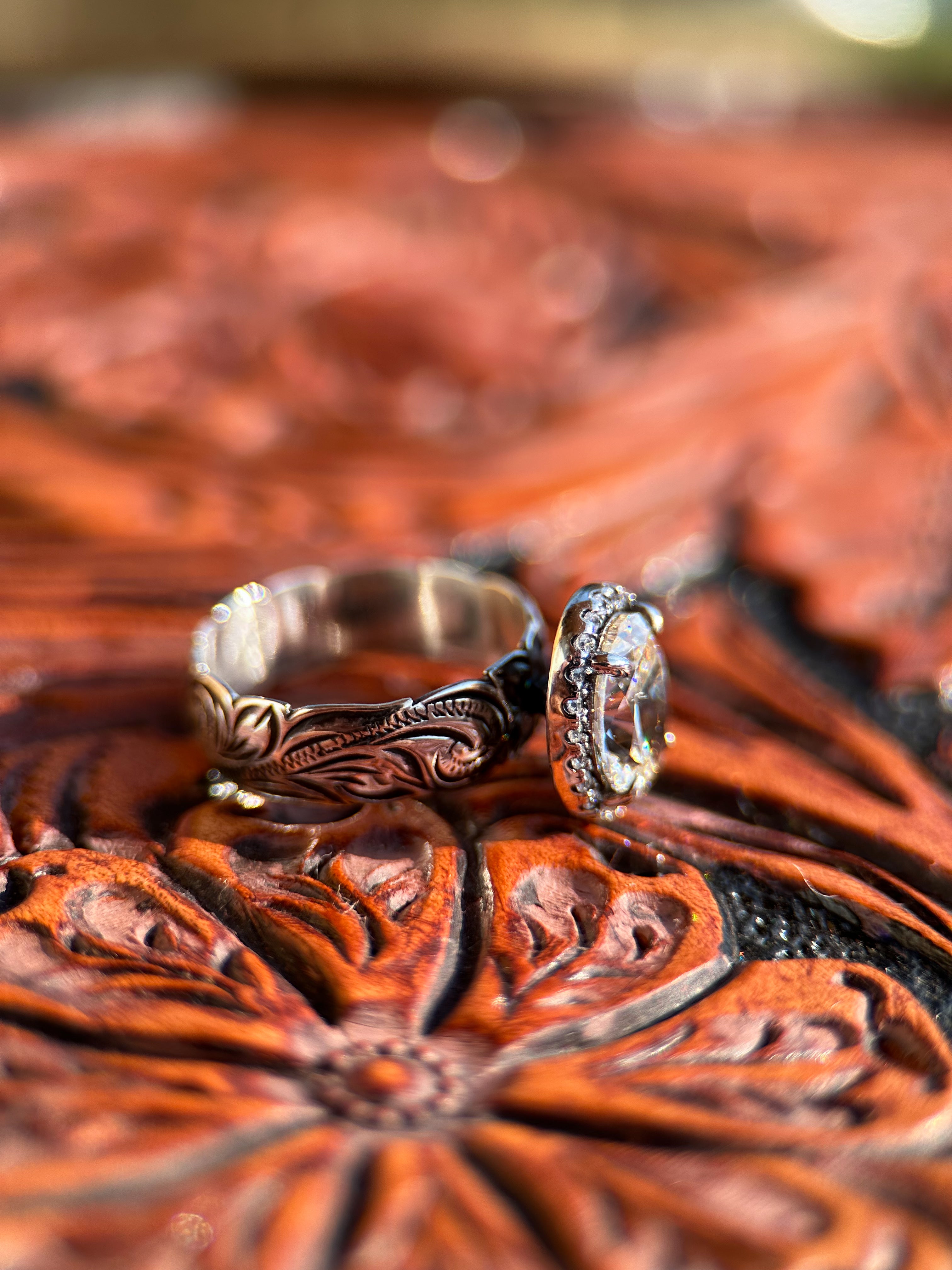 OVAL HALO ENGAGEMENT RING.