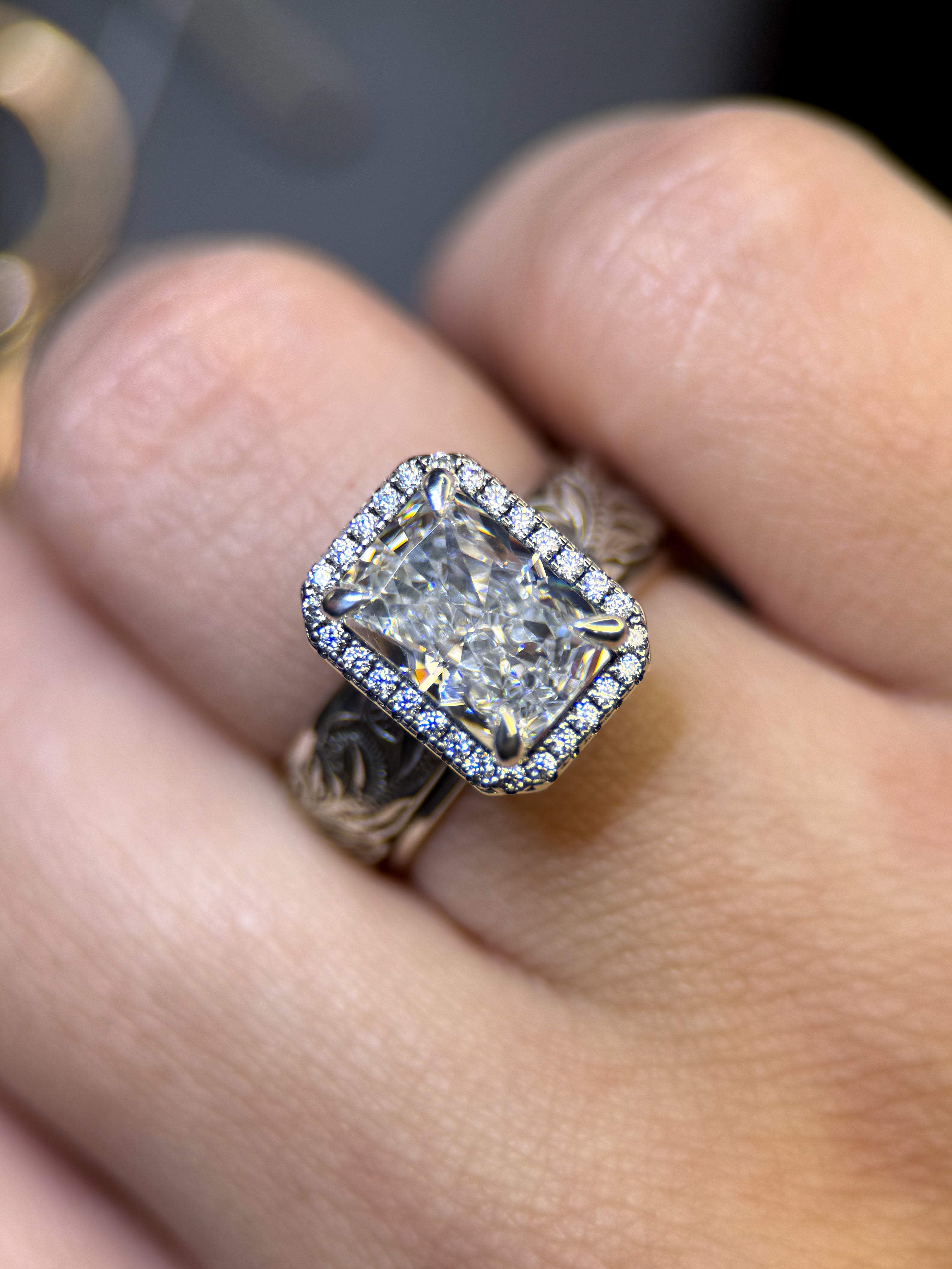 OVERLAY RADIANT CUT ENGAGEMENT RING.
