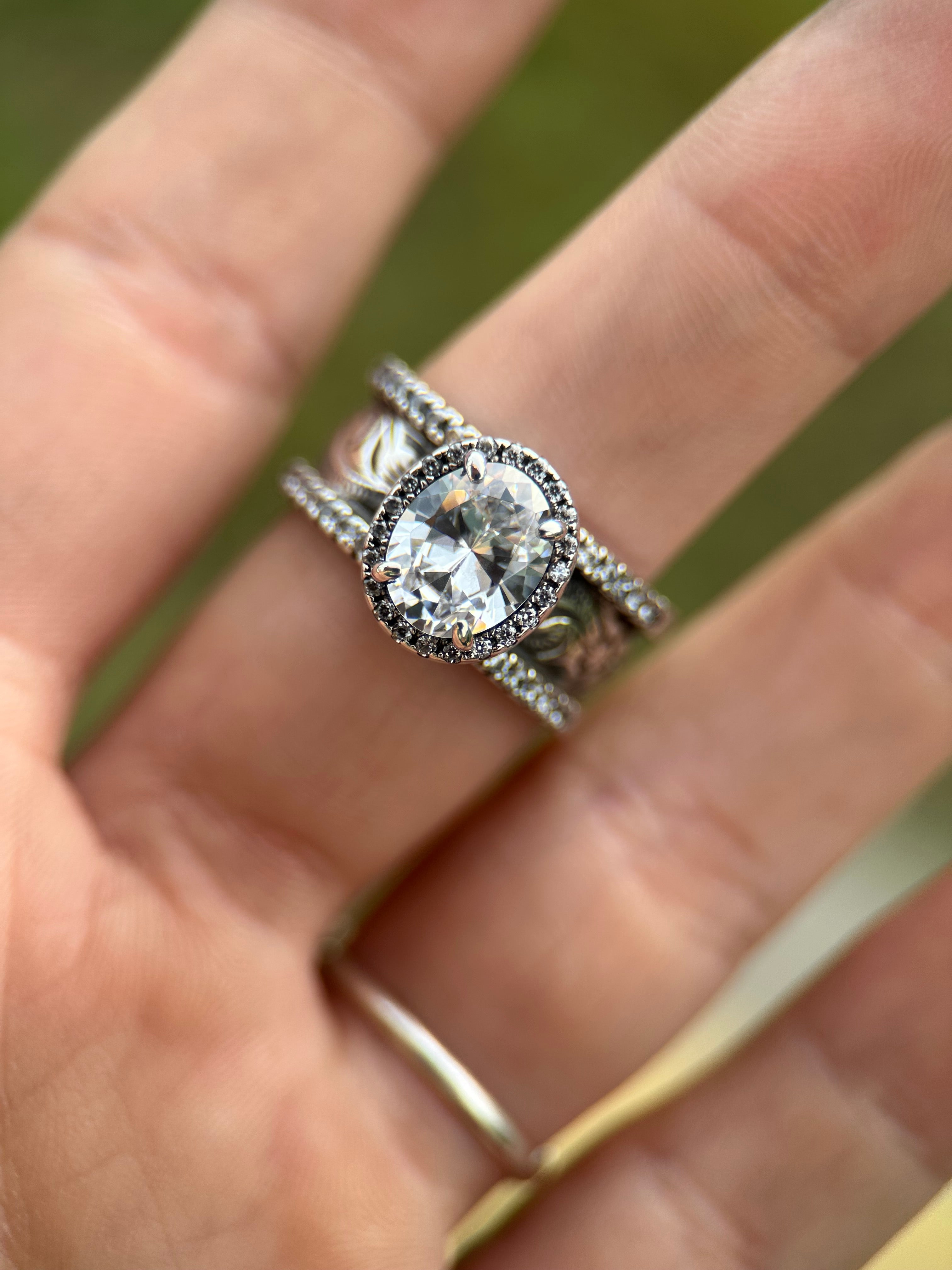 OVAL HALO PAVÈ CIGAR ENGAGEMENT RING.