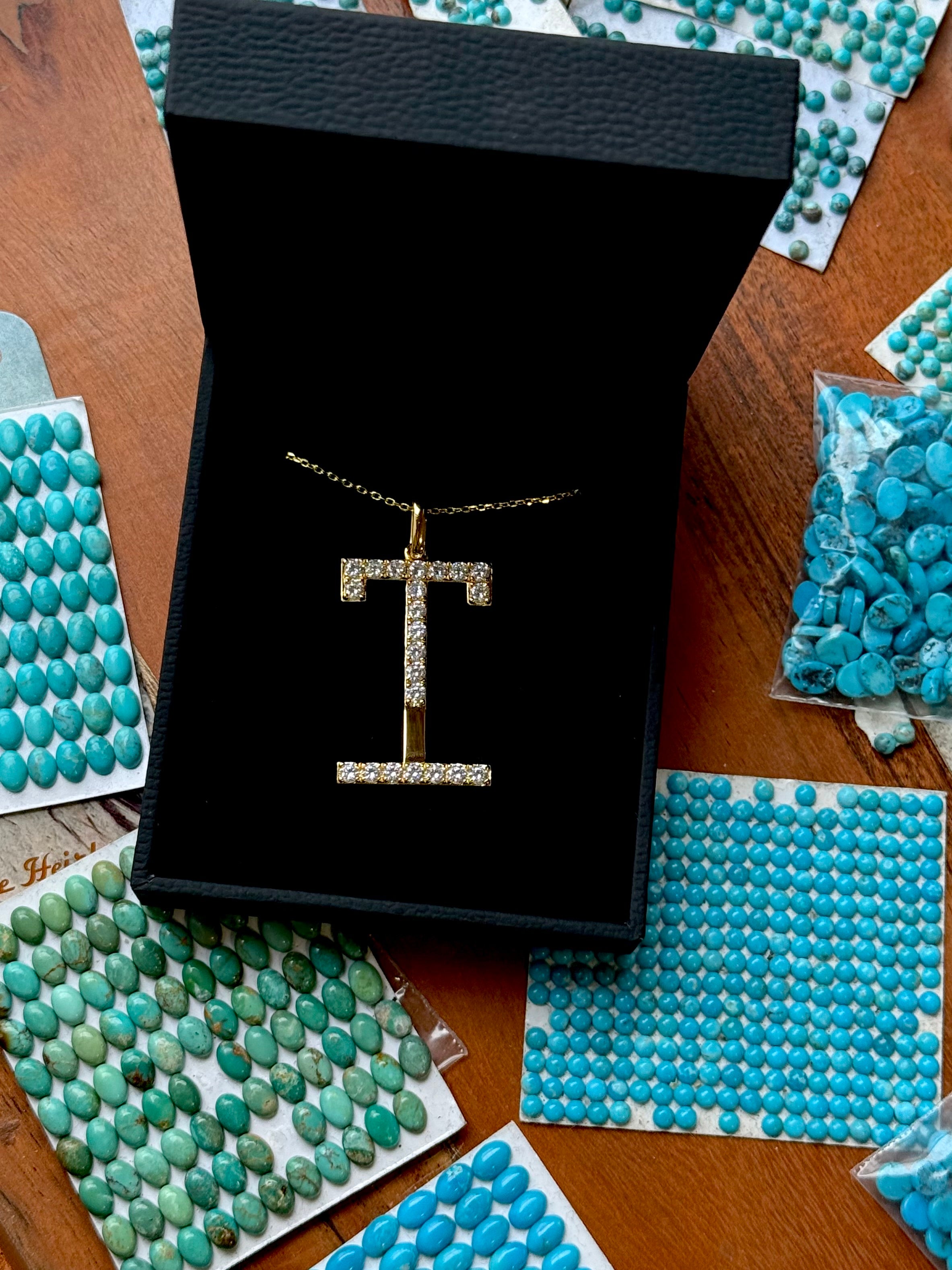 ORIGINAL GOLD PAVÈ BRAND PENDANT.