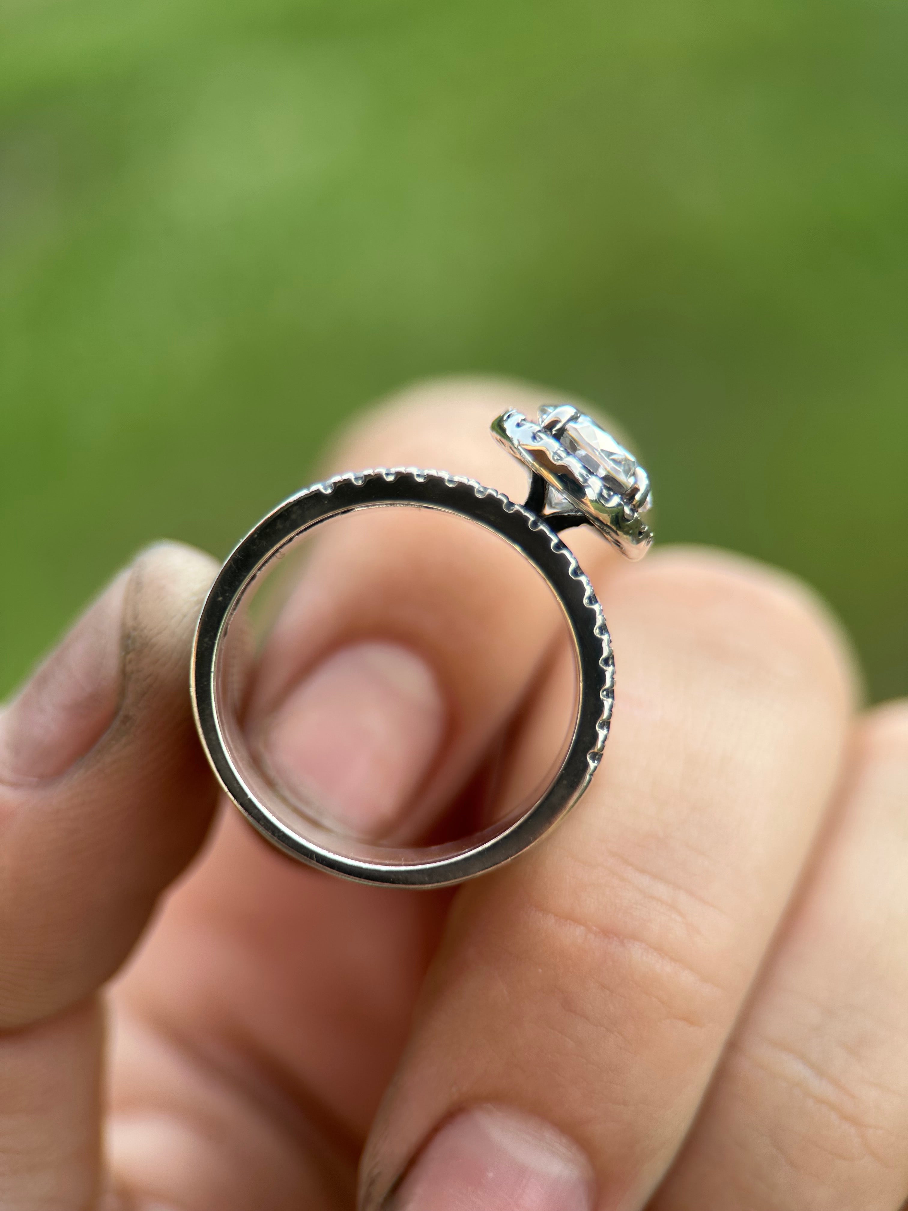 OVAL HALO PAVÈ CIGAR ENGAGEMENT RING.