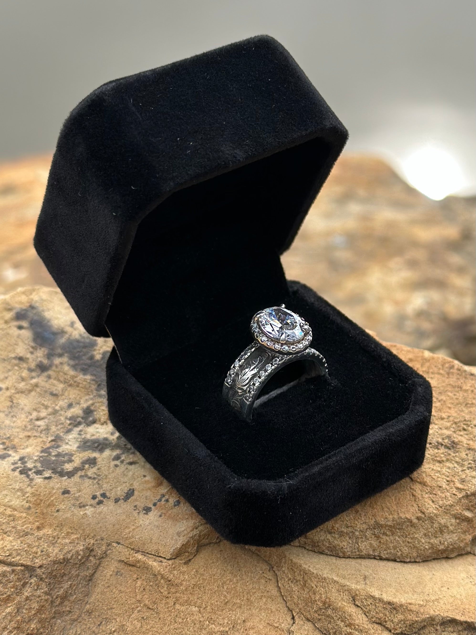 OVAL HALO PAVÈ CIGAR ENGAGEMENT RING.