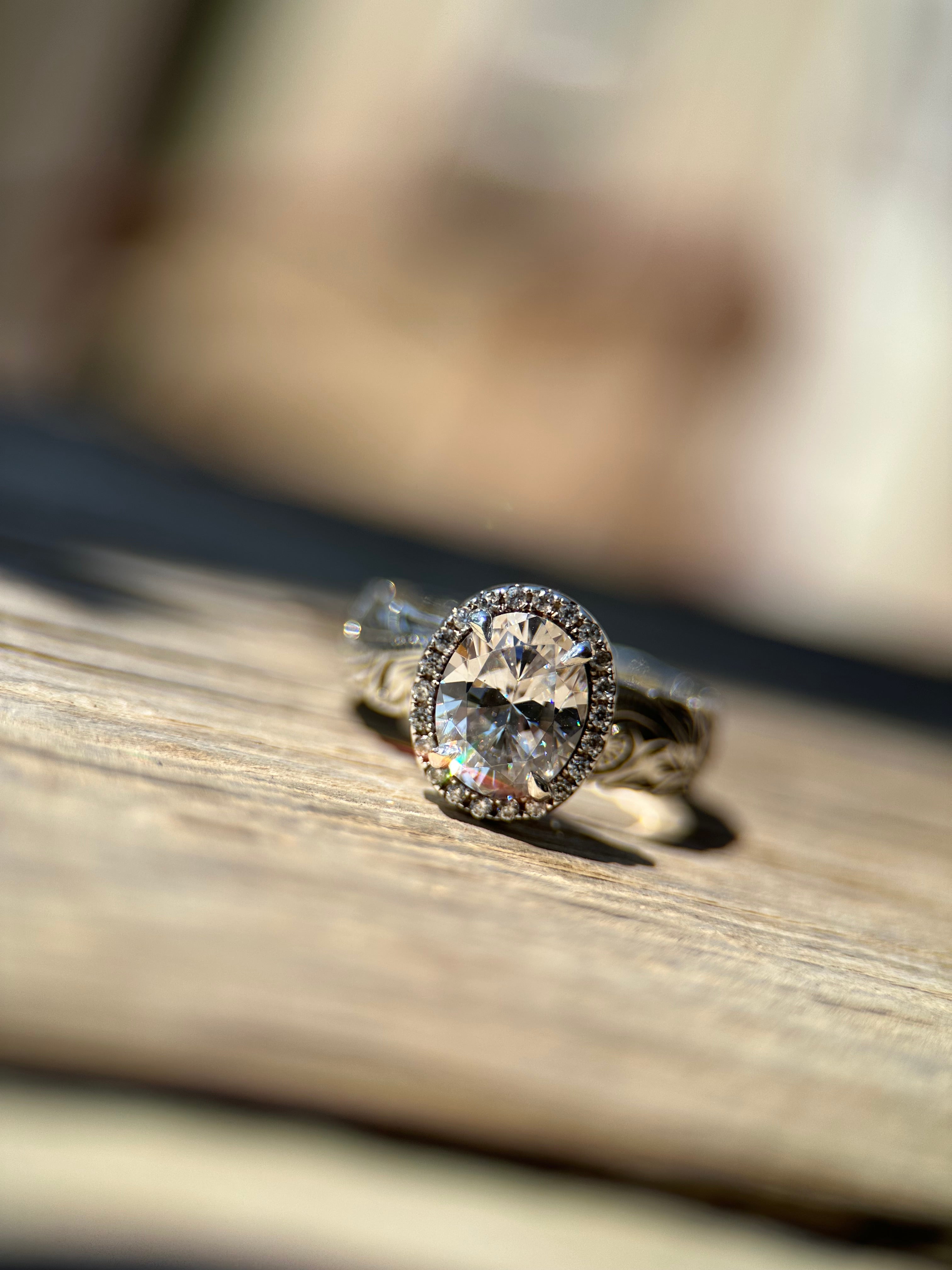 OVAL HALO ENGAGEMENT RING.