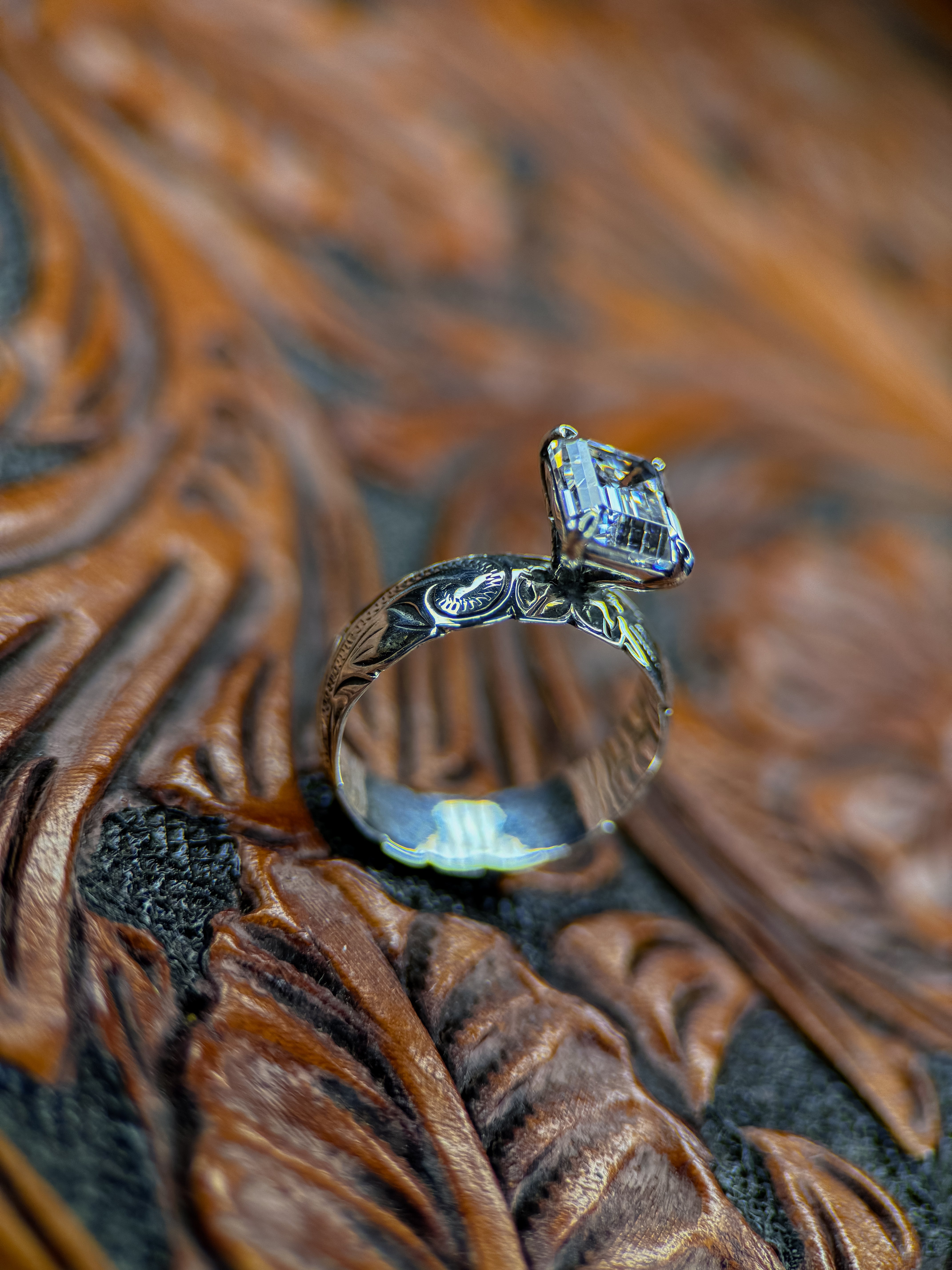 EMERALD SOLITAIRE ENGAGEMENT RING.