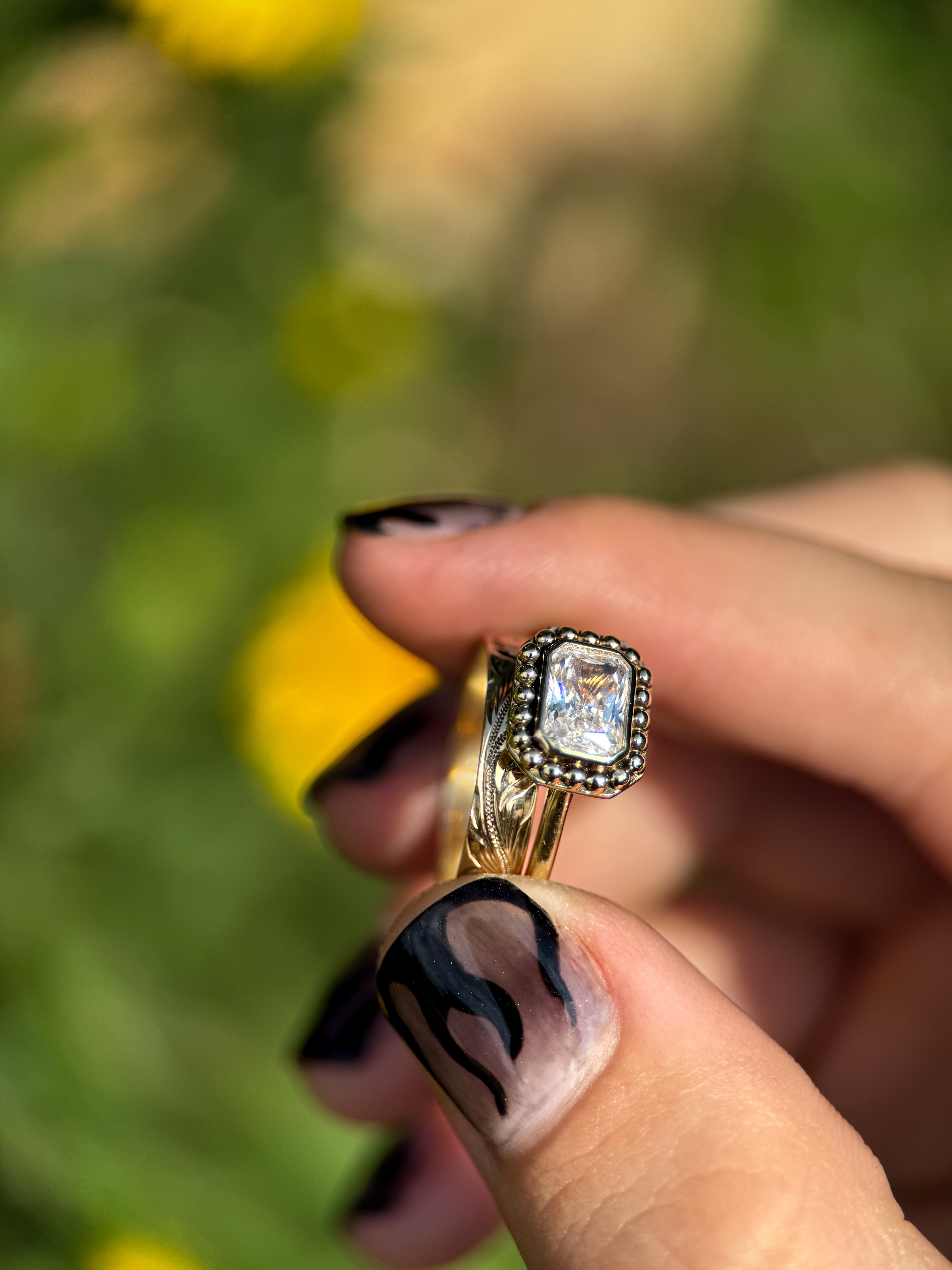 EAST WEST EMERALD MOISSANITE 14k YELLOW GOLD SET.